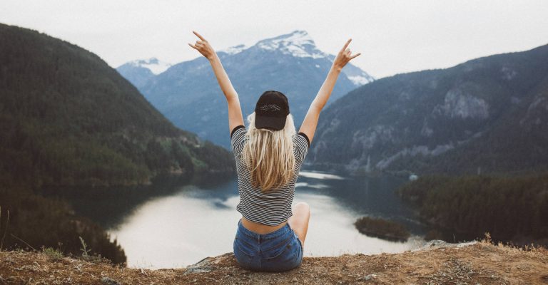 Woman looking at the mountains