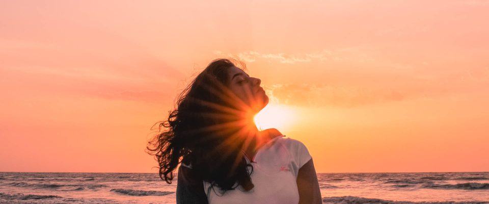 Woman standing on beach