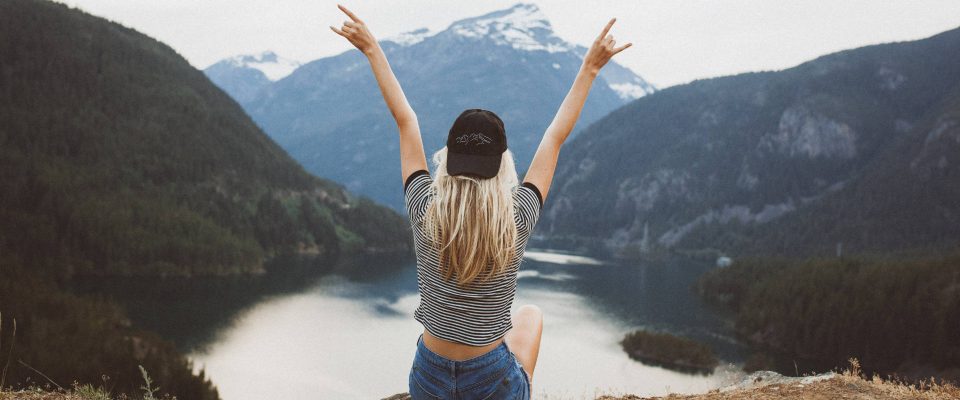 Woman looking at the mountains